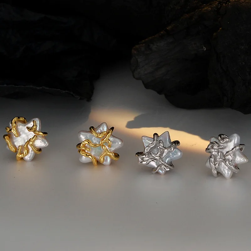 Star-shaped stud earrings with unique design. S925 pure silver earrings featuring pearl lines intertwined with star patterns.