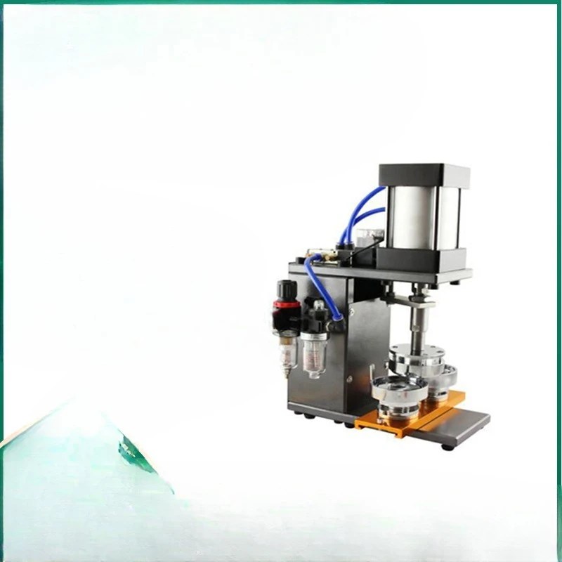 All automatic, pneumatic badge machine
