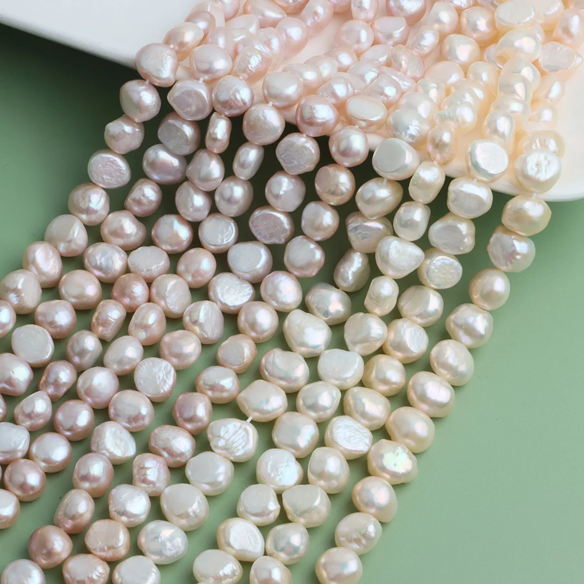 

Источник возврата Натуральный пресноводный пресноводный жемчуг 10-11 мм с перекрестным отверстием Двусторонний светильник в стиле барокко Работает в прогрессивной нити «сделай сам»