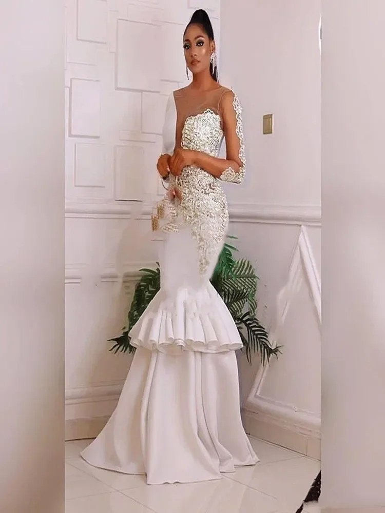 Vestidos de novia de sirena nigeriana africana personalizados, apliques de encaje con cuello transparente, mangas largas, vestidos de novia con múltiples volantes de talla grande