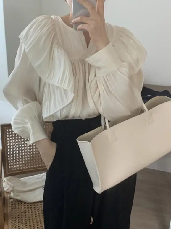 

2025 autumn and winter new women's temperament pleated pleated skirt women's spring new super fairy bubble sleeve top