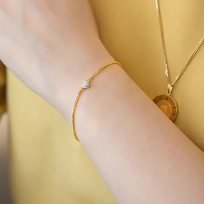 Huitan Luxus-CZ-Armband für Damen, goldfarbene Kette, trendiges, schlichtes und elegantes weibliches Handarmband, verstellbarer Modeschmuck