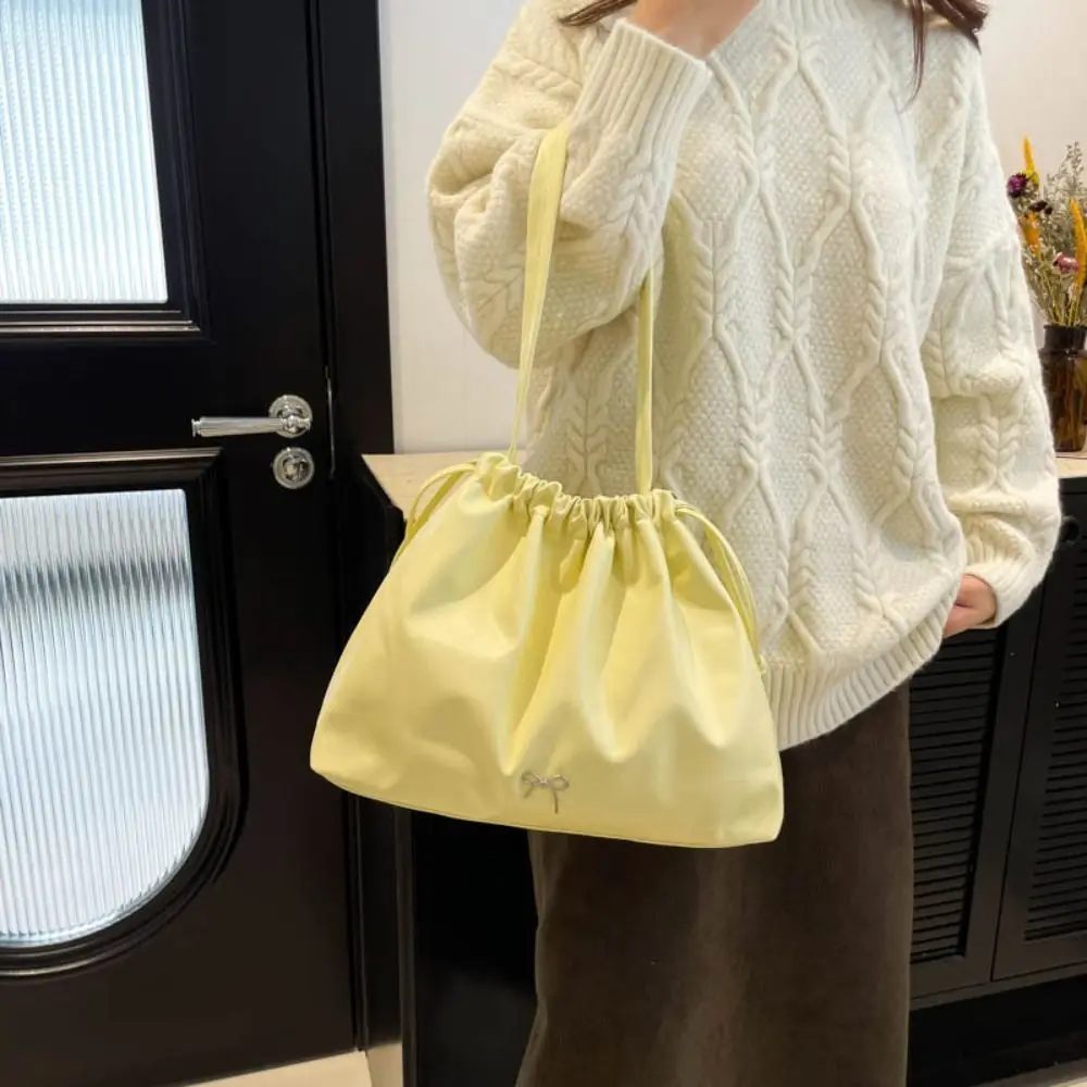 

Large Capacity Drawstring Shoulder Bag Solid Color Bow PU Dumpling Bag Handbag Fashion Design French Style Handbag Shopping
