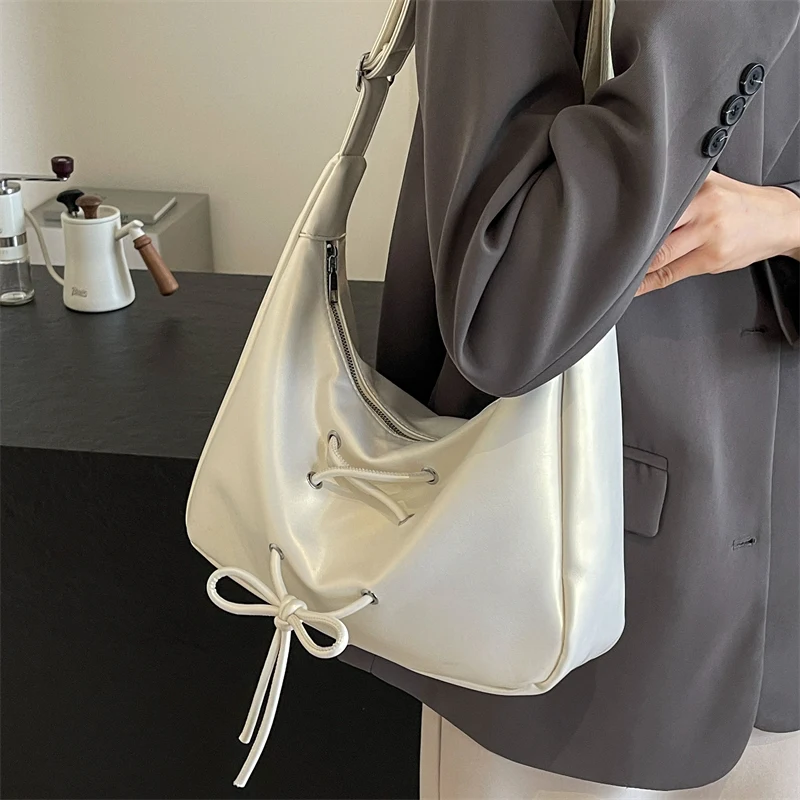 Petits sacs sous les bras en cuir PU pour femmes, sac à bandoulière, sacs à main et sacs à main initiés, design à nœud aught, nouvelle tendance, 2024