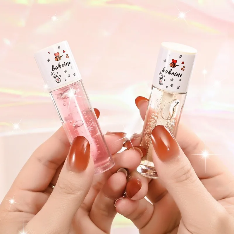 น้ำผึ้งลิปออยล์ มอยซ์เจอร์ไรเซอร์ รีแพร์ริ่ง ไลท์เทนนิ่ง ลิป ฮันนี่ พูทติ้ง แอนตี้-ดรายนิ่ง ลิปบาล์ม มาส์ก