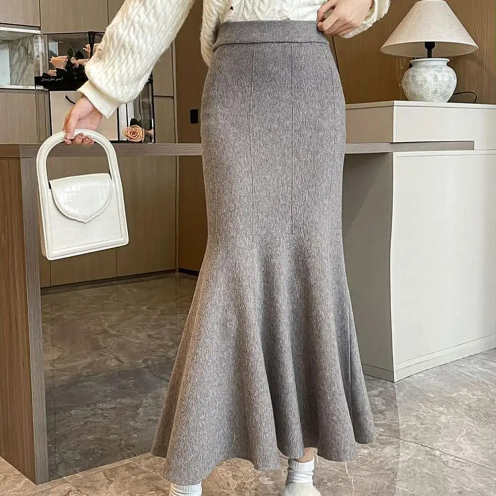 

Fashion solid color knitted fishtail dress female autumn and winter new Korean version of temperament pendant sense of mid-lengt