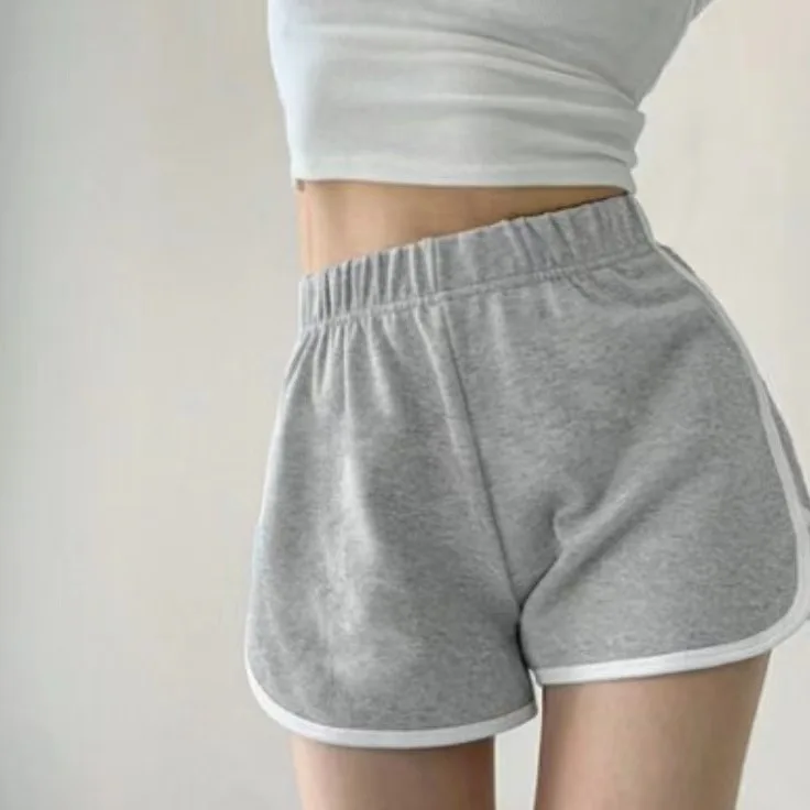 Pantalones cortos deportivos para mujer verano 2025 nuevo Color caramelo Anti vaciado pantalones cortos ajustados Casual señora cintura elástica playa Correndo pantalones cortos