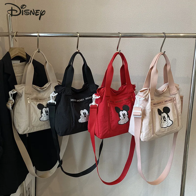 

Новая женская сумка с Микки Диснеем, модная высококачественная студенческая сумка для хранения на открытом воздухе, большая вместительная сумка через плечо для девочек с героями мультфильмов