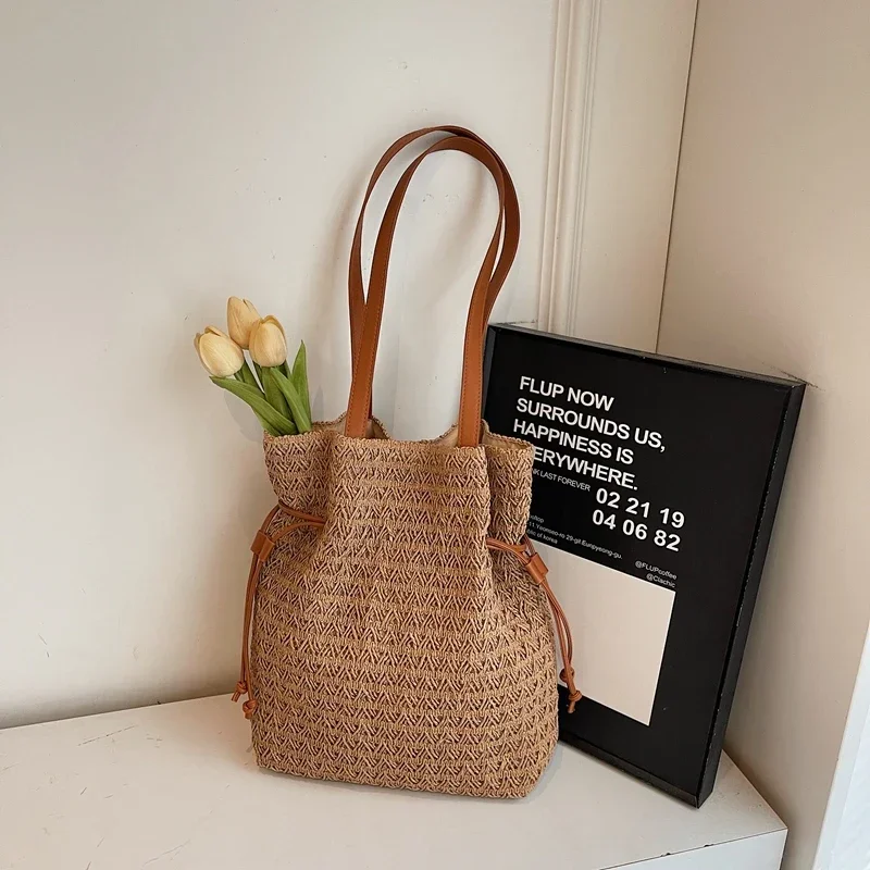 

Hollow Straw Woven Solid Bucket Beach Niche String Women's Bags on Sale 2025 Fashion Sewing Versatile Women's Handbags