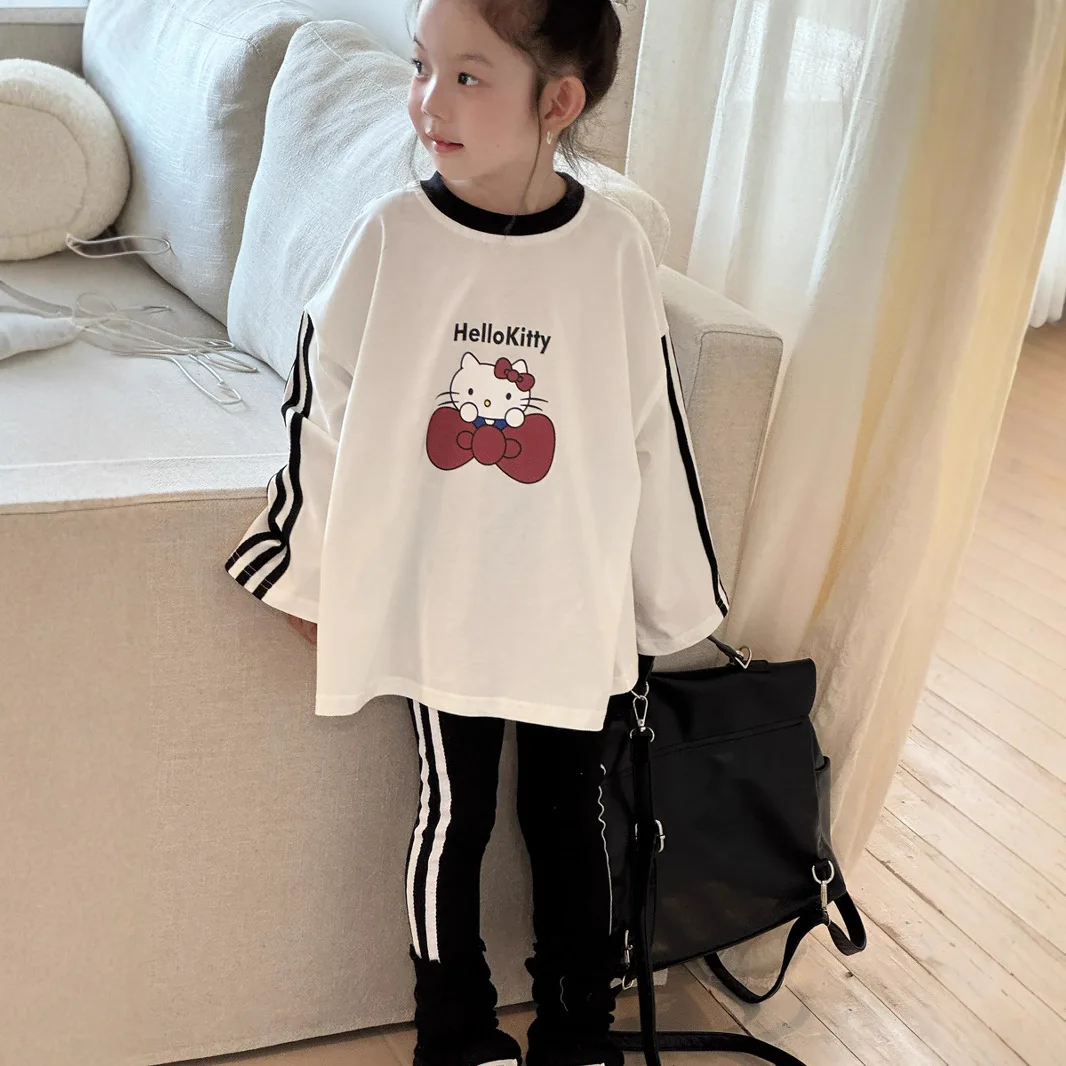 أنيمي HelloKitty الفتيات النسخة الكورية الخريف تي شيرت القوس القط مطبوعة بأكمام طويلة تي شيرت الأطفال ثلاثة بار فضفاض رداء علوي غير رسمي