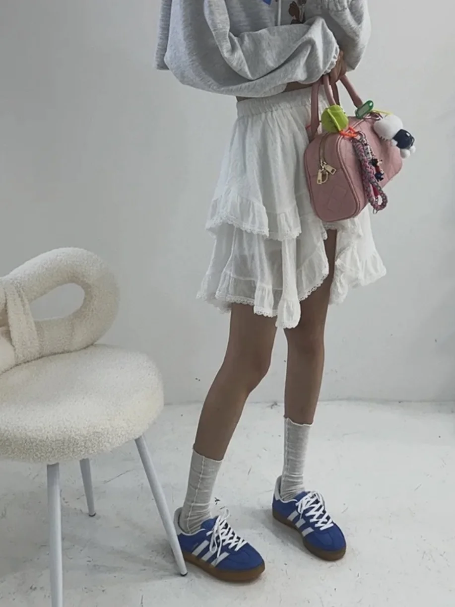 Falda acampanada con encaje Irregular para mujer, cintura elástica, adelgazante, plisada, antienvejecimiento, versátil, para pastel, Faionable