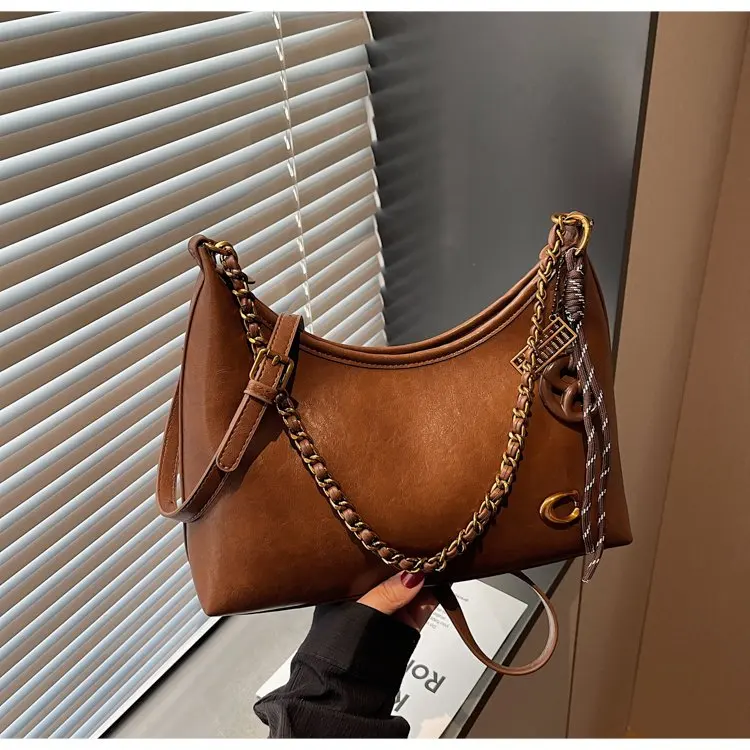 

Новая женская сумка 2026 года: вместительная, простая, модная, на цепочке, через плечо, в стиле ретро, универсальная, для повседневного использования