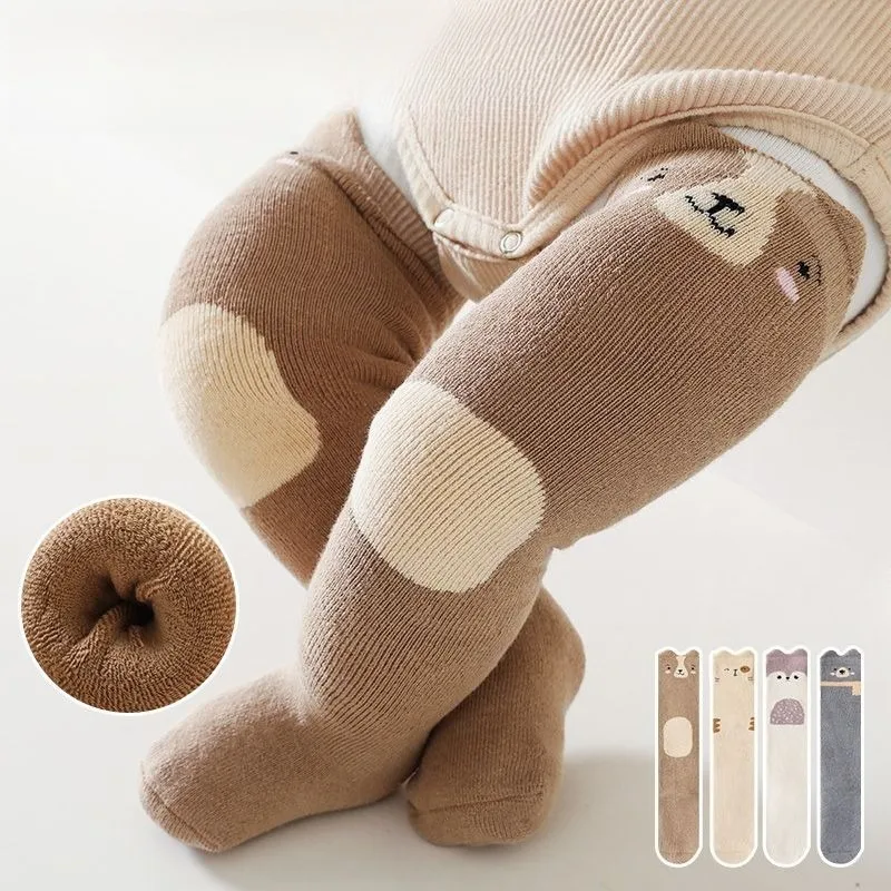 ถุงเท้าเด็กหนาสำหรับฤดูหนาว ถุงเท้าเทอร์รี่แบบยาวถึงเข่า สำหรับเด็กแรกเกิด ให้ความอบอุ่น ทรงหลวม ดีไซน์น่ารัก กันลื่น