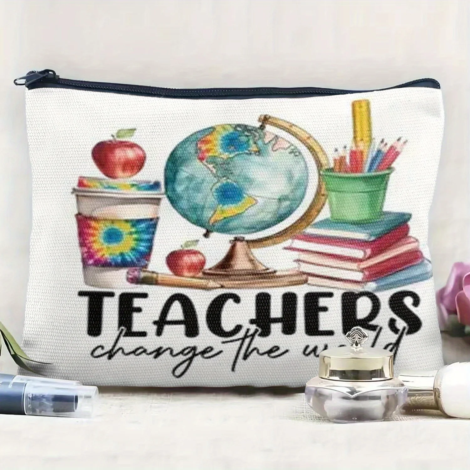 Education Changes the World Makeup Bag Featuring a Globe Books Pencils and Notebook Design This Lightweight Back-to-School Gift