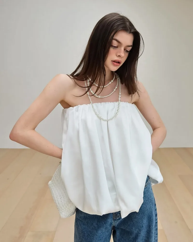 

2025 Summer New Foreign Trade Wholesale Pure Desire Style Commuting Skirt Strap Loose solid color Fashionable Light Luxury Top