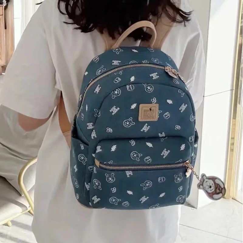 새로운 컬렉션 디즈니 위니 푸우 여성 배낭 패션 데님 가방 만화 인쇄 브랜드 배낭 소녀 학생 배낭