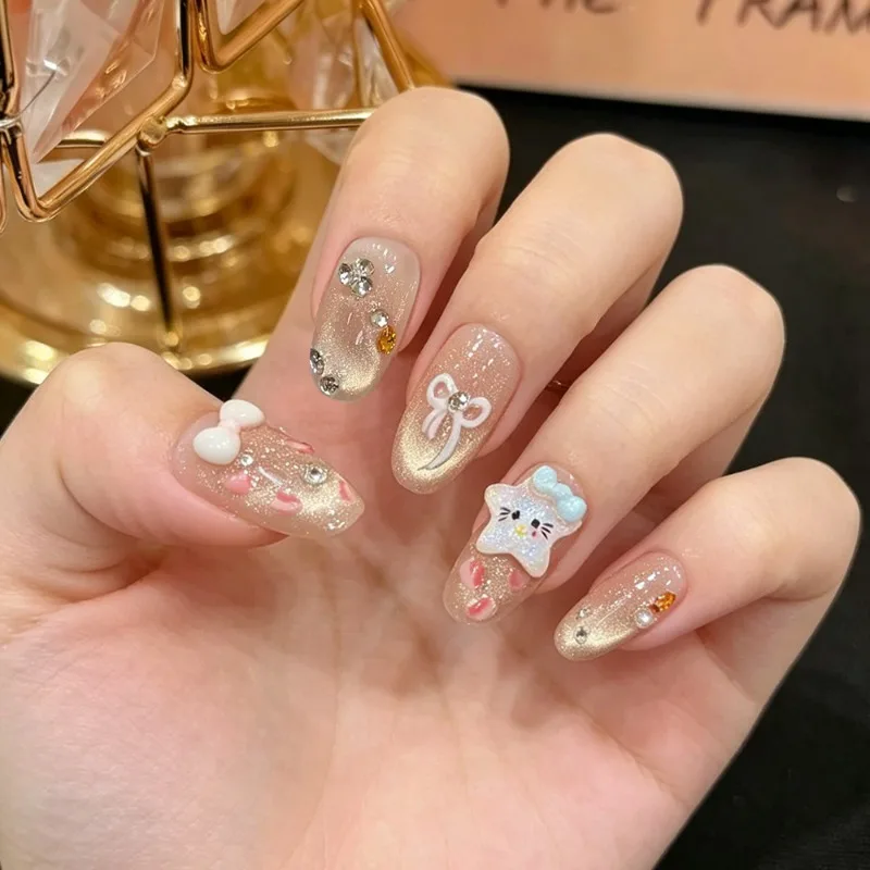 

24PCS Champagne Gradient Cat Eye Oval Press on Nails 3D Star Sweet Bowknot French Fake Nails with Rhinestones Almond Nail Tips