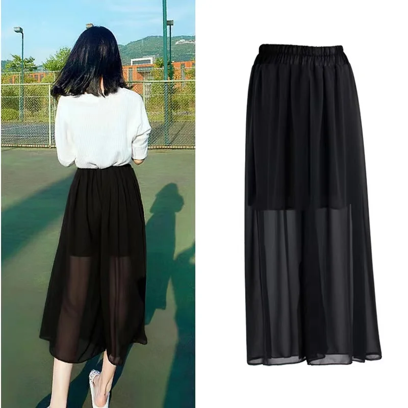 

Женский летний повседневный комплект из двух предметов: брюки с высокой талией и широкими штанинами, а также шелковая шифоновая юбка-кюлоты длиной 7/8. Модный и универсальный.