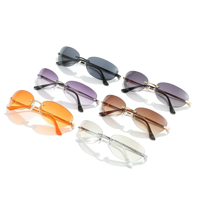 

Popular Punk Outdoor Rimless Sunglasses for Men Women Round Frame Cat Eye Goggles Eyewear Retro Fashion UV400 Sun Glasses