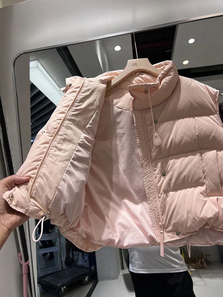 Women's short style stand collar down jacket vest 2025 winter new fashion design loose white duck down jacket trend