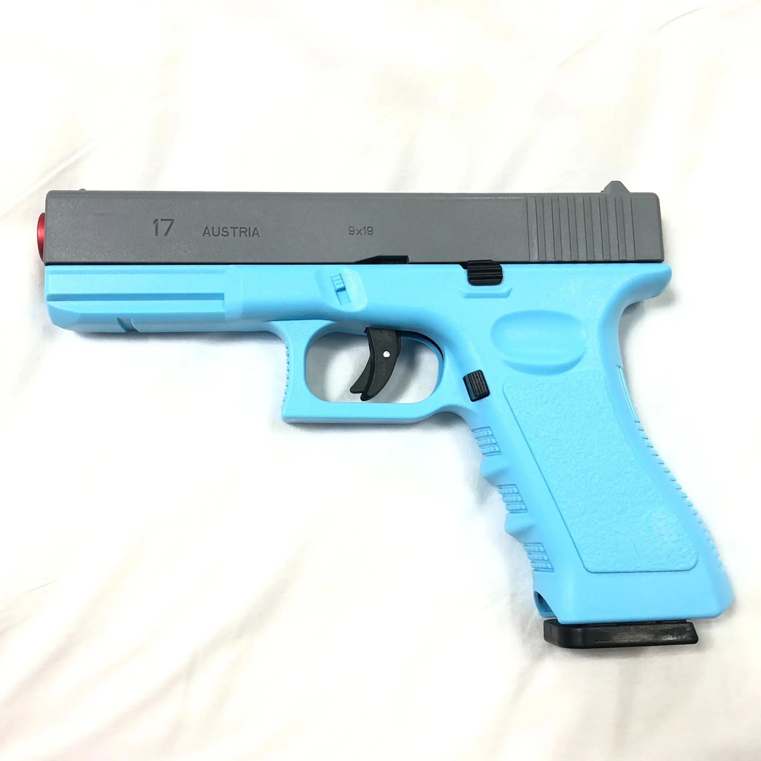 Dual-Mode ปืนของเล่น G17 เลเซอร์รุ่นอัตโนมัติยิงหัวไชเท้าปืน SHELL Ejection Soft Bullet ปืนพก CS อาวุธสําหรับเด็ก