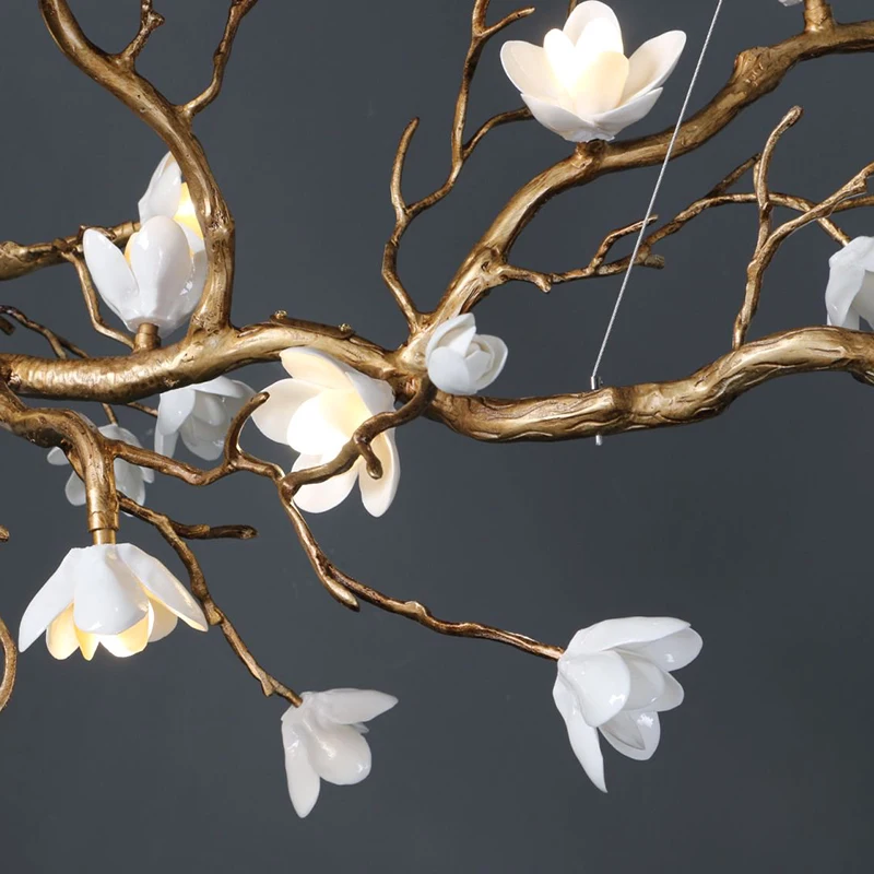 Lampe suspendue en forme de branche d'arbre en céramique et cuivre de style nordique, adaptée à l'éclairage des salons et des restaurants d'hôtel. Corps noir.