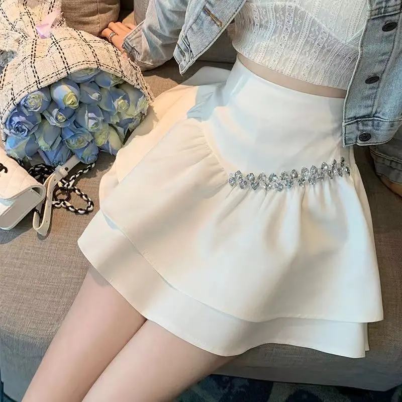 Elegant A-line skirt, women's anti glare, niche white high waisted short skirt, slimming skirt