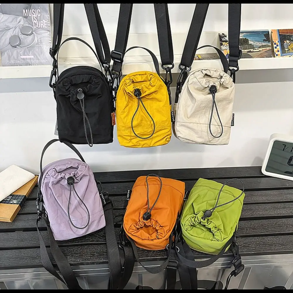

Quick-dry Sports Nylon Shoulder Bag Solid Color Coin Pouch Drawstring Crossbody Bag Korean Style Casual Mobile Phone Pack Male