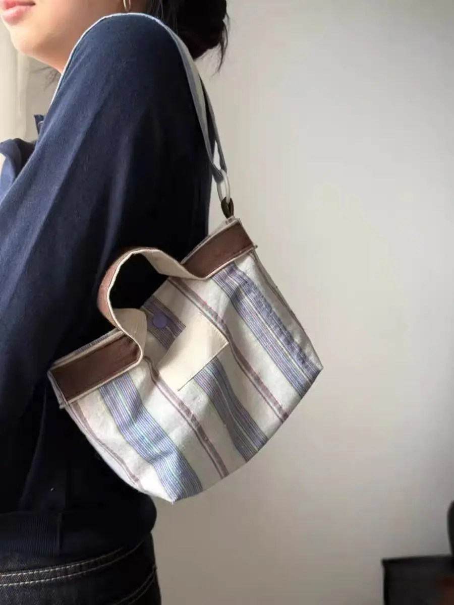 nova-bolsa-tote-feminina-2025-com-listras-e-blocos-de-cor-estilo-casual-alca-macia-bolsa-transversal-de-lona-da-moda-para