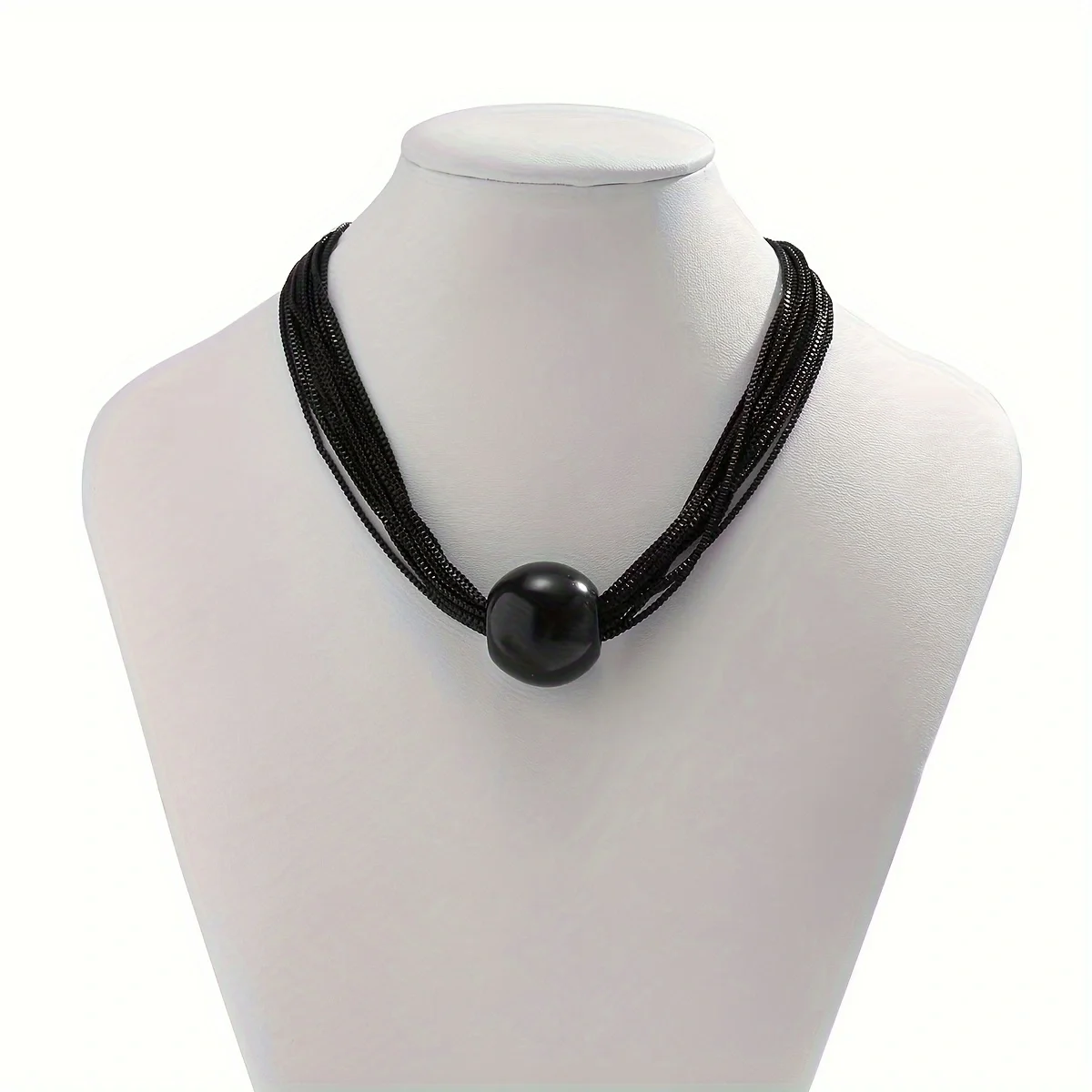 An exaggerated punk multi-layer chain overlaid with a personality necklace featuring a niche geometric sphere