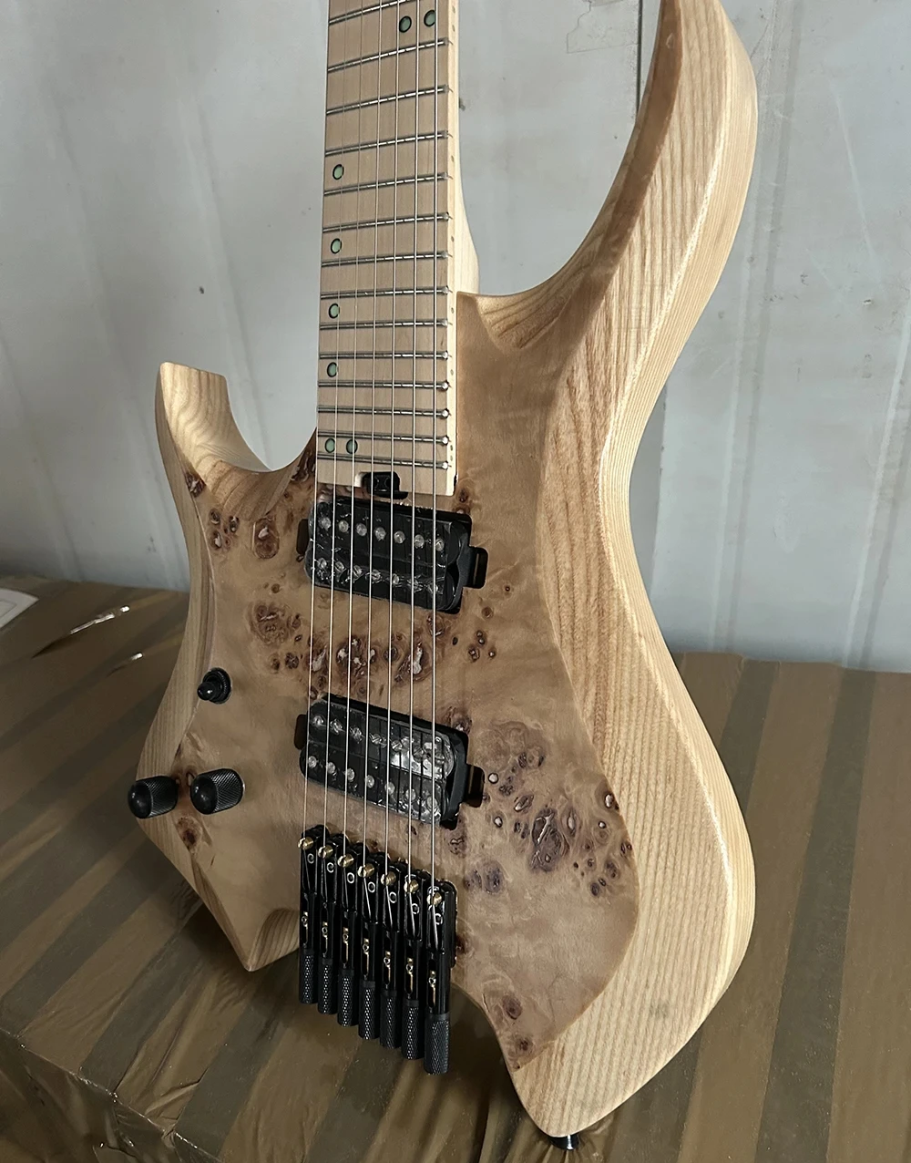 High Quality Headless Fanned Frets Left Handed 7 Strings  Guitar Ash Body Burl Maple Veneer Factory Customizable