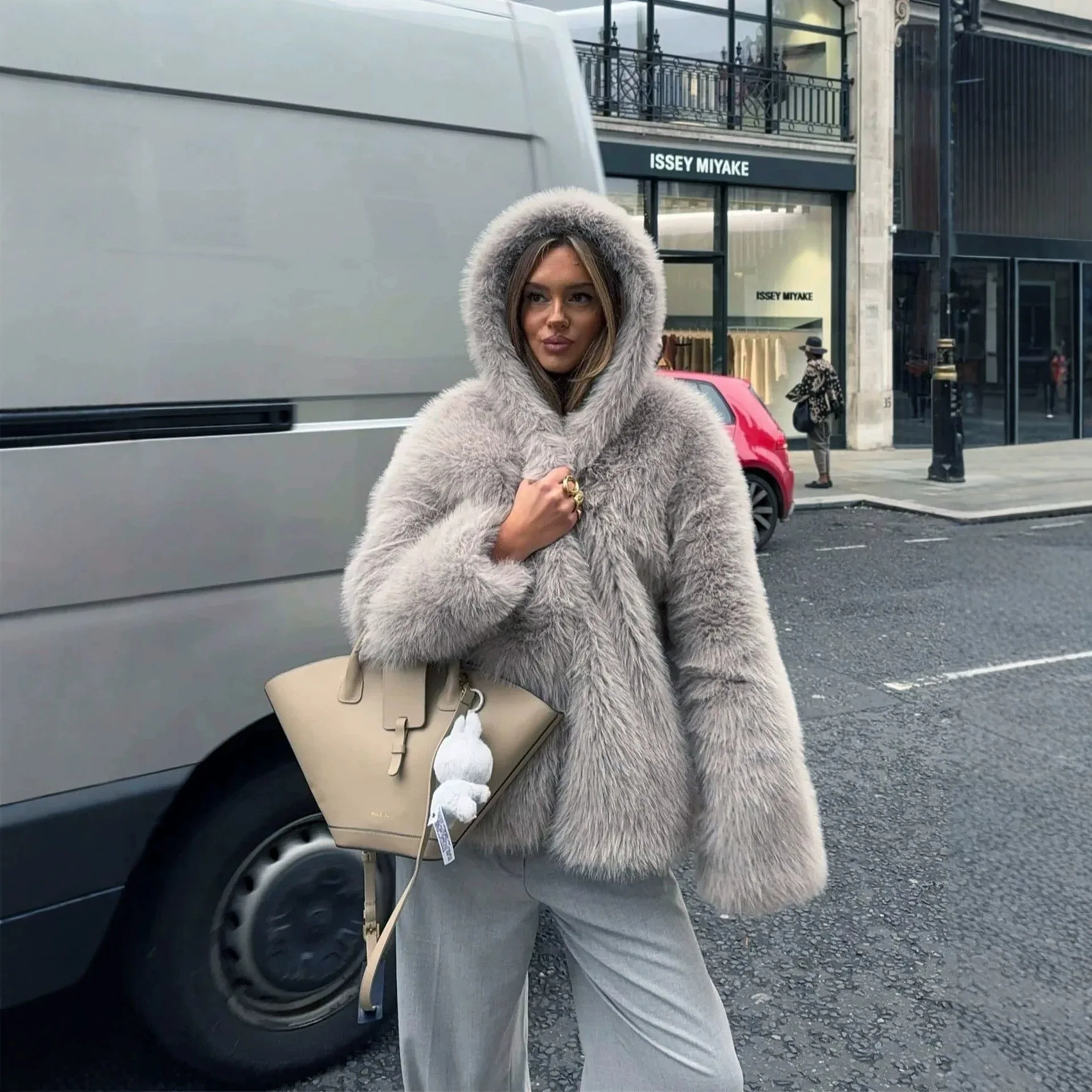 Autumn and winter imitation fox hair short women's hooded fur imitation fur jacket loose environmentally friendly plush jacket