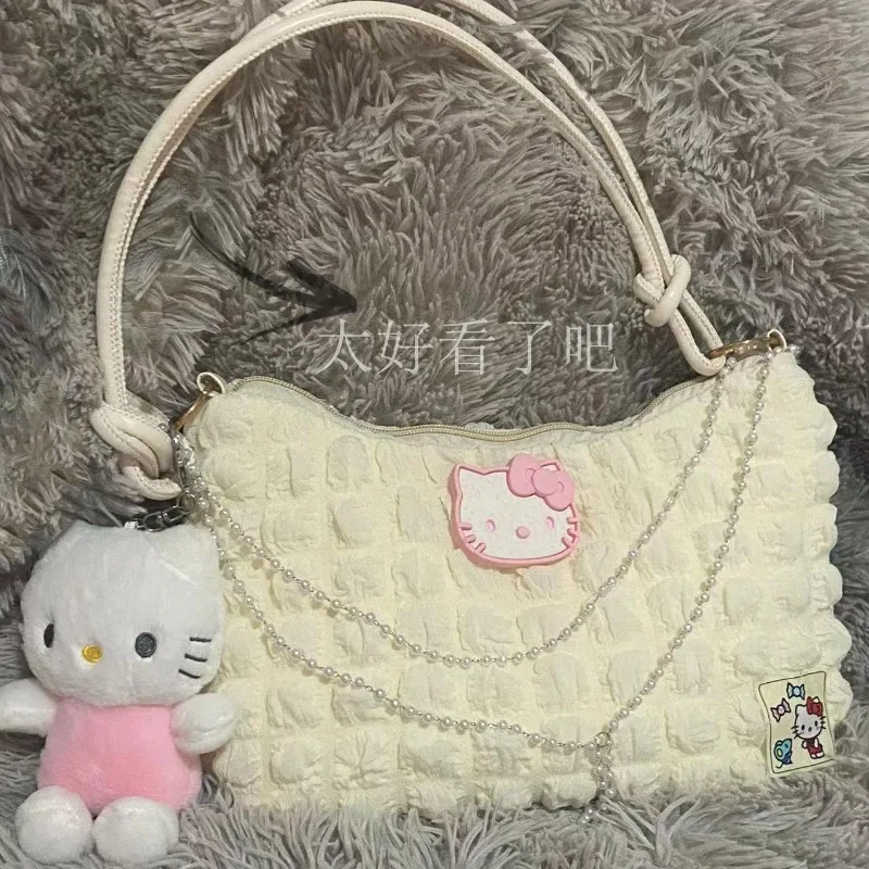 Sanrio-Bolso de hombro con cadena de perlas para niña, bolsa de mano con contraste de Color de Hello Kitty, a la moda