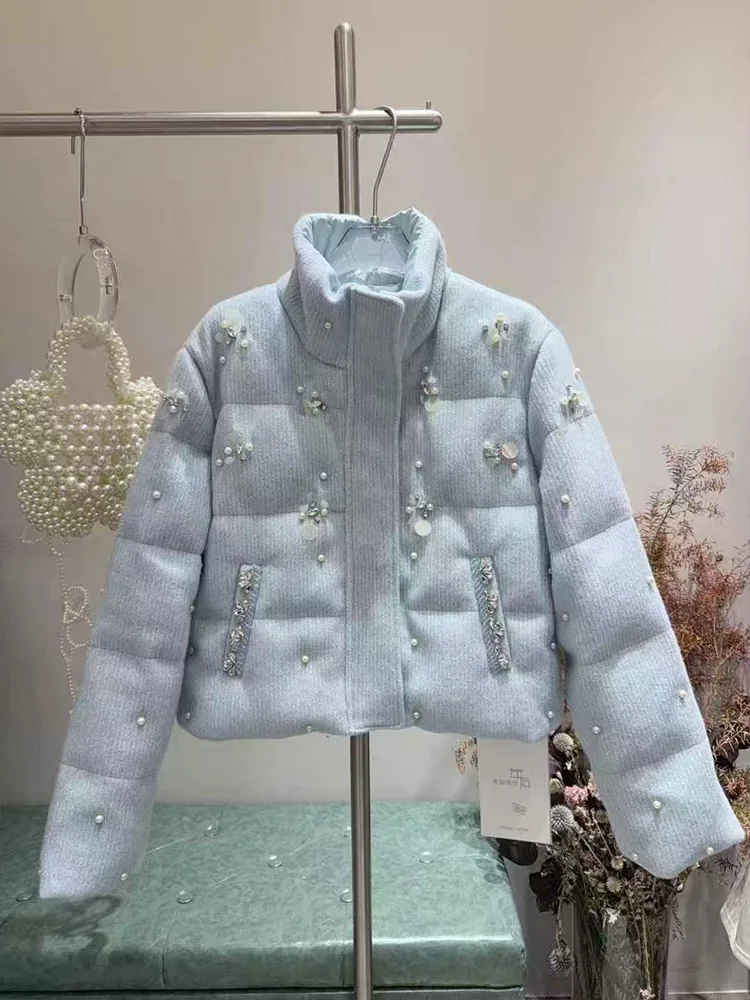 Рисунок 2 - Женские зимние новые модные пуховые пальто 202