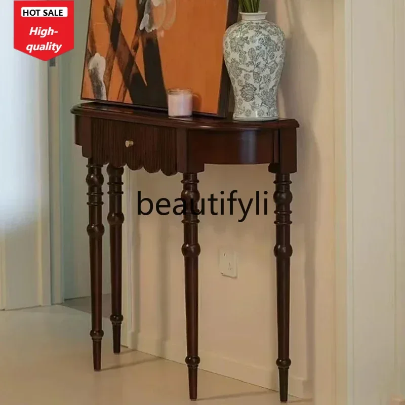 

Входной столик из цельного дерева в американском стиле ретро. Входной фойе. Узкий стол у стены. Полукруглый изогнутый стол с торцем. D1089