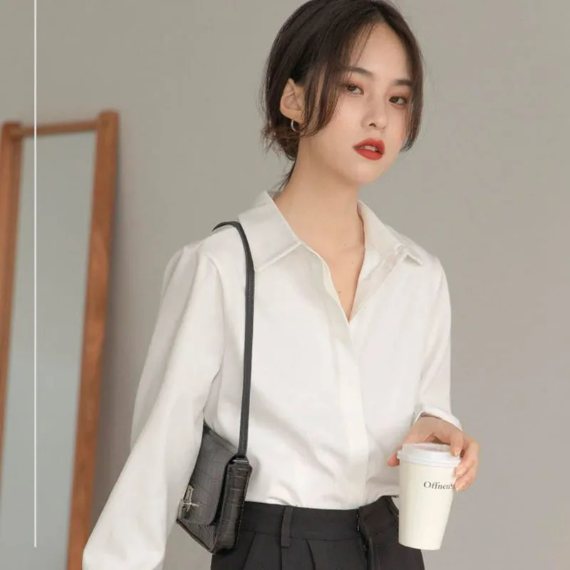 เสื้อชีฟองสีขาวสำหรับผู้หญิง สไตล์ใหม่ ฤดูใบไม้ผลิ 2026 ดีไซน์หรูหรา เหมาะสำหรับทำงาน ใส่ทำงานได้ ดูดี มีระดับ เสื้อคลุมแบบเรียบง่าย สบายๆ