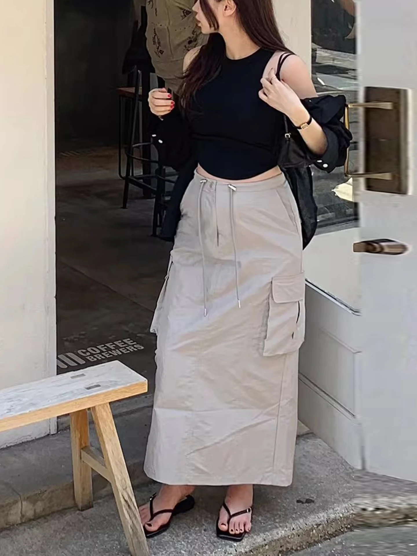 

Весенняя новинка: женская рабочая юбка с завязками на талии, разрезом сзади и высокой талией из полиэфирного волокна