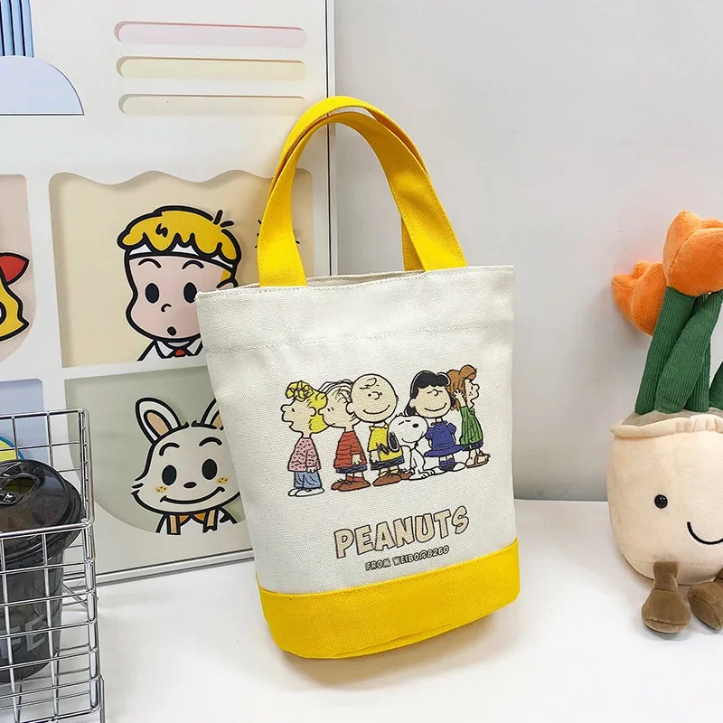 2026 Neue Mode Heiße Snoopy Bucket Bag Cartoon Canvas Tasche Bedruckte Handtasche Lunch Bag Modische Hot Mom Tasche – Detail 6