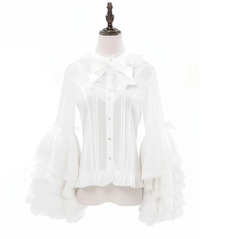 เสื้อเชิ้ตสไตล์โลลิต้าหวานซ่อนเปรี้ยว แต่งลูกไม้สไตล์แฟรี่คอร์ คอตั้ง ผูกโบว์ แขนทรงแตรใหญ่ ติดกระดุมแถวเดียว สีชมพูหวานๆ สำหรับผู้หญิง