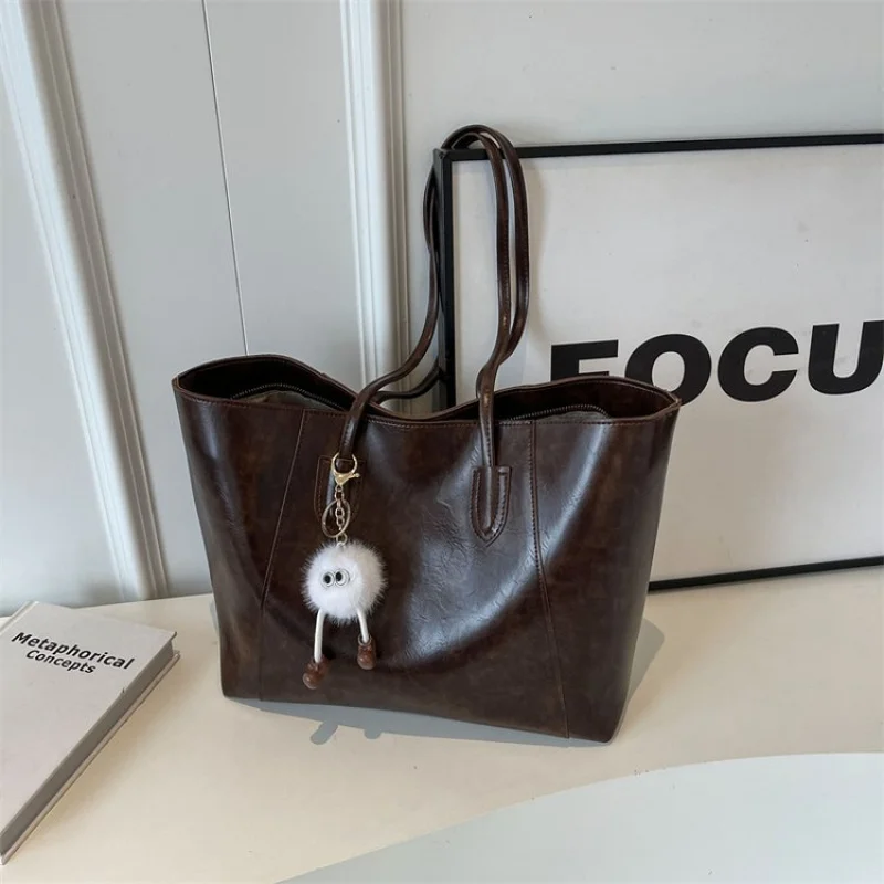 

Luxury Minimalist Shopper Bag For Women With Trendy Logo Large Capacity Solid Color Elegant Style And Leather Material