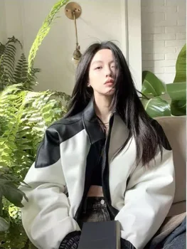 Chaqueta de cuero de empalme de contraste blanco y negro para mujer, abrigo de manga larga, diseño suelto, moda Vintage China, primavera y otoño