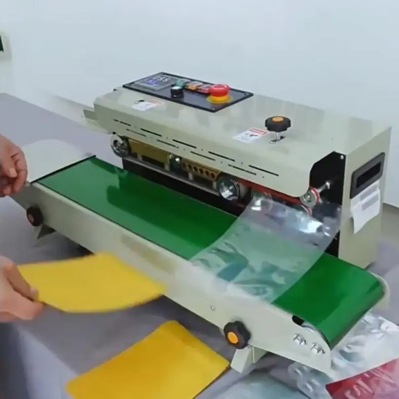 Automatic Film Sealing Machine Plastic Bag Packaging FR-900C Foil Bag Sealer for Business & Industrial Use