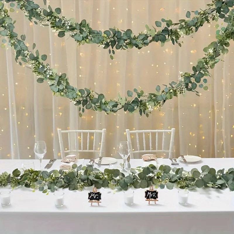 

7-Piece Set of 6-Foot Artificial Eucalyptus and Willow Vines with White Flowers - Versatile Green Leaf Garland for Wedding, Engagement, Home and Event Decoration, All-Season Classic Style Wedding Theme