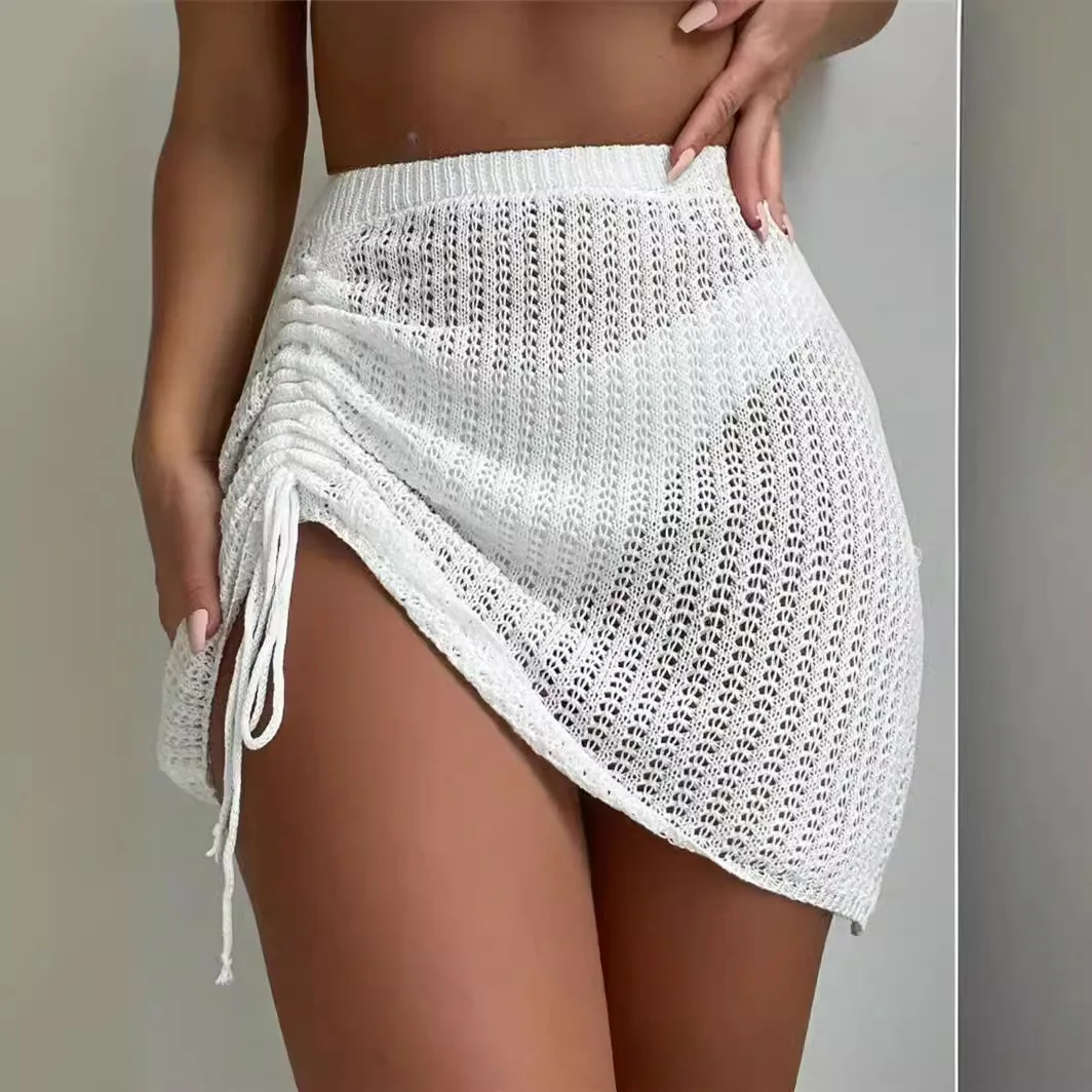 2026 Summer Women's New Beautiful Beach Vacation Skirt Knitted Hollow Hip Drawstring Sexy See-through Beach Skirt