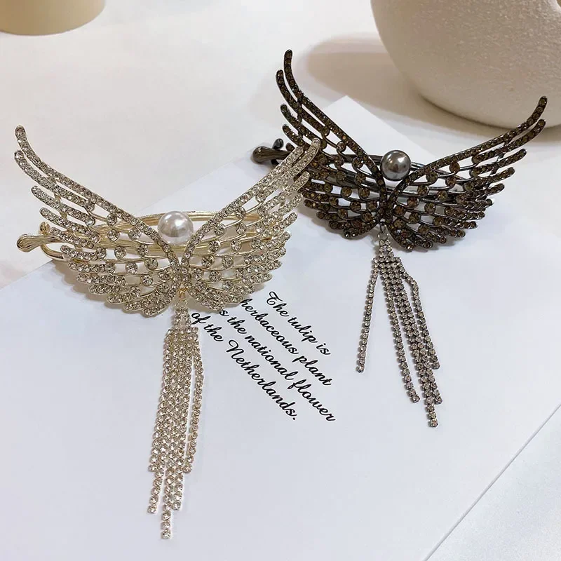 Metal glitter hollow butterfly tassel bead twist clip female hair clip on the back of the head. hair clips  butterfly