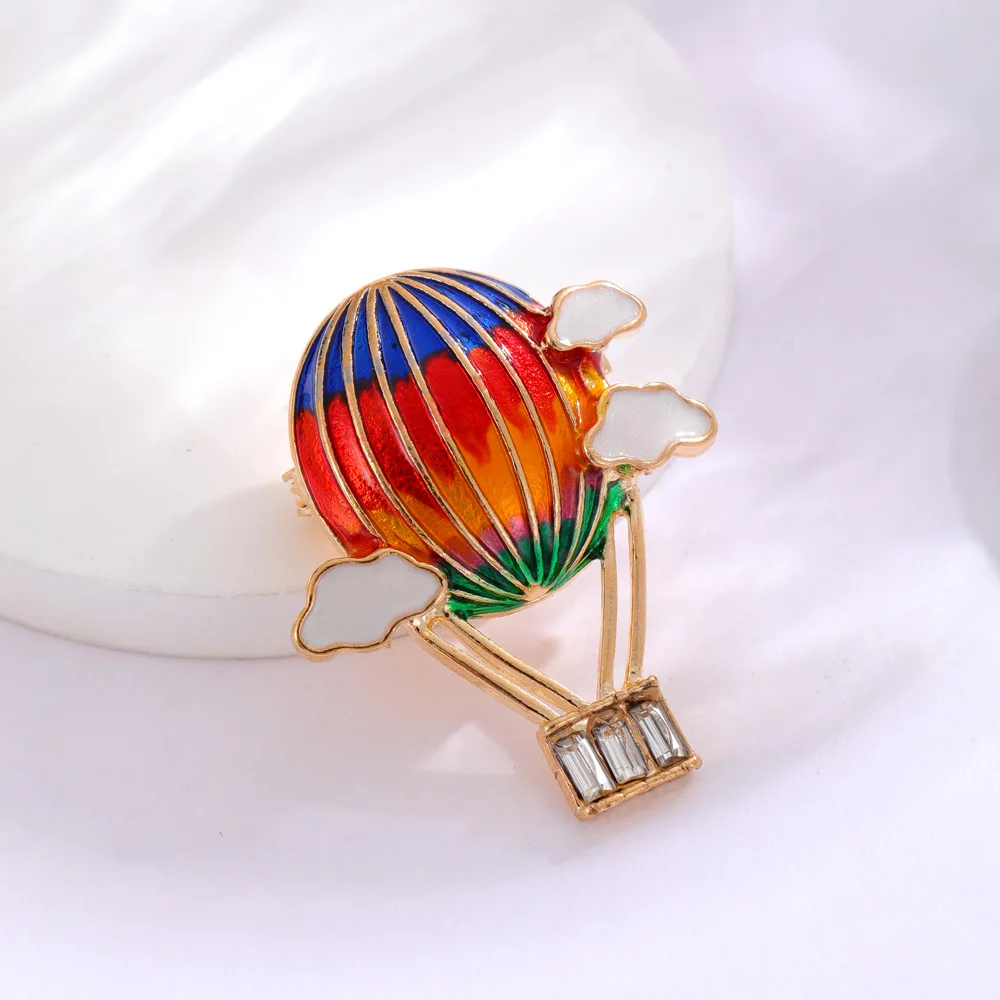 New Korean version hot air balloon drip oil brooch, fashionable cartoon inlaid with diamonds, colorful cloud flower clothing acc