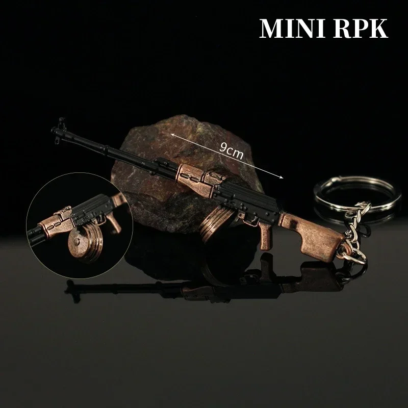 Nova arma de metal chaveiro pubg ak 47 mini glok arma modelo liga pistola luz chaveiro pingente presente brinquedo coleção