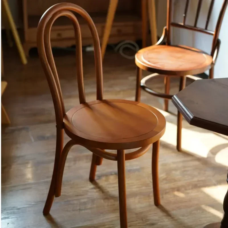 Nordic Medieval Dining Chair, Ergonomic Backrest, Retro Solid Wood Seating for Comfortable Classic Dining Room Arrangements