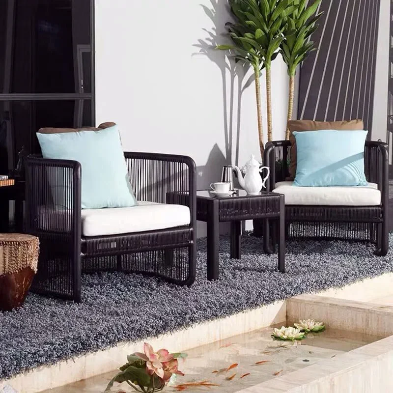 Outdoor-Rattan-Sofa-Kombination Neue chinesische Outdoor-Homestay Outdoor-Balkon-Rattan-Tisch- und Stuhlkombination Freizeit-Rattan