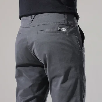Pantalones informales ajustados para hombre, ropa de calle elástica con botones, novedad de primavera y otoño